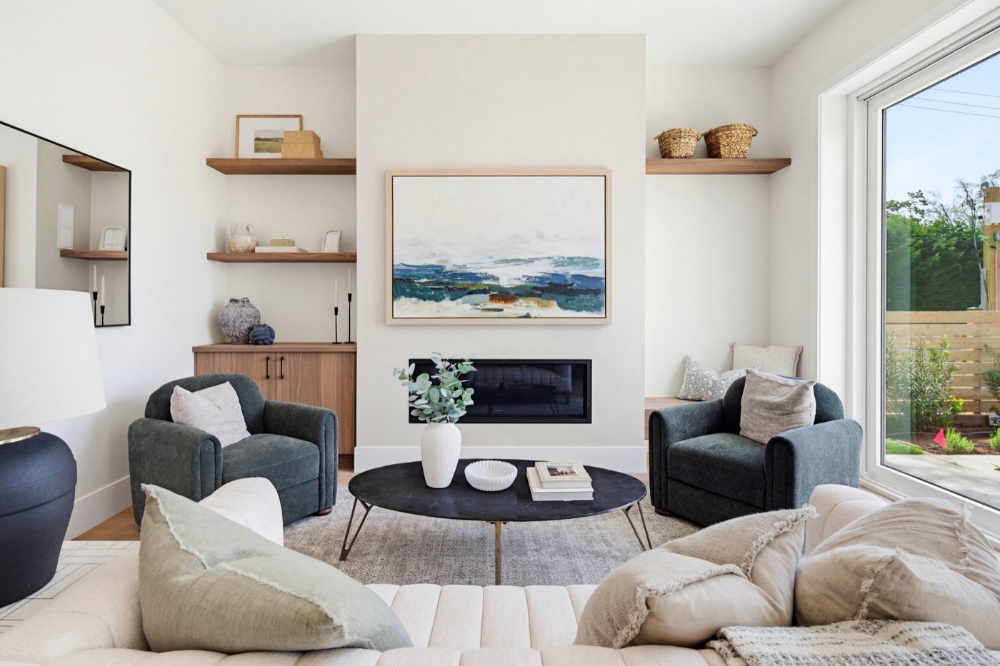Modern luxury living room with custom stone fireplace