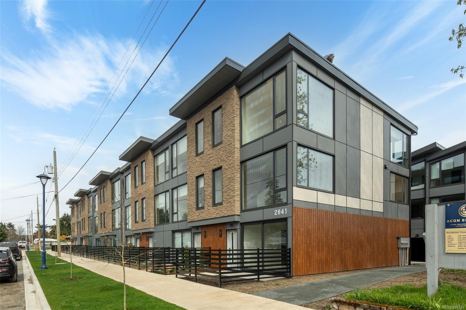 Knotty Pine project: street view of townhome development row