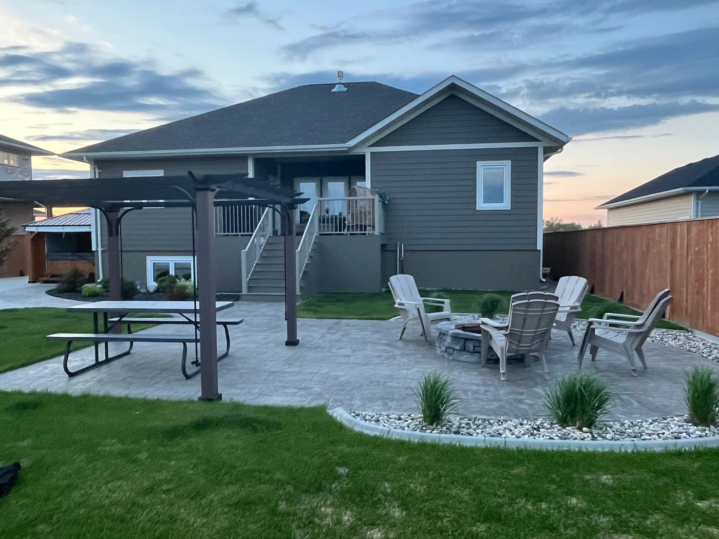 Prairie Craftsman: backyard patio with firepit